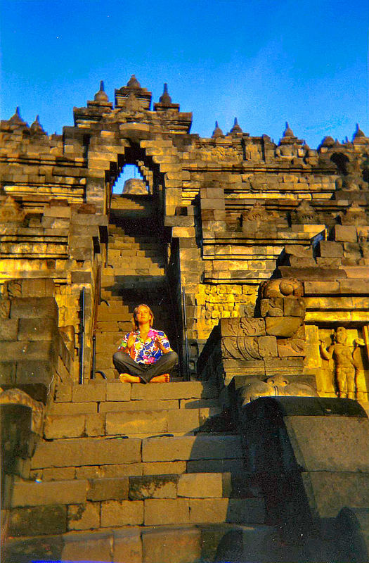 Indonesia, Java "Photographer - Praying at Borobodur"