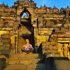 Indonesia, Java "Photographer - Praying at Borobodur"