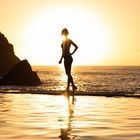 Infinity: Woman's silhouette on an infinity pool