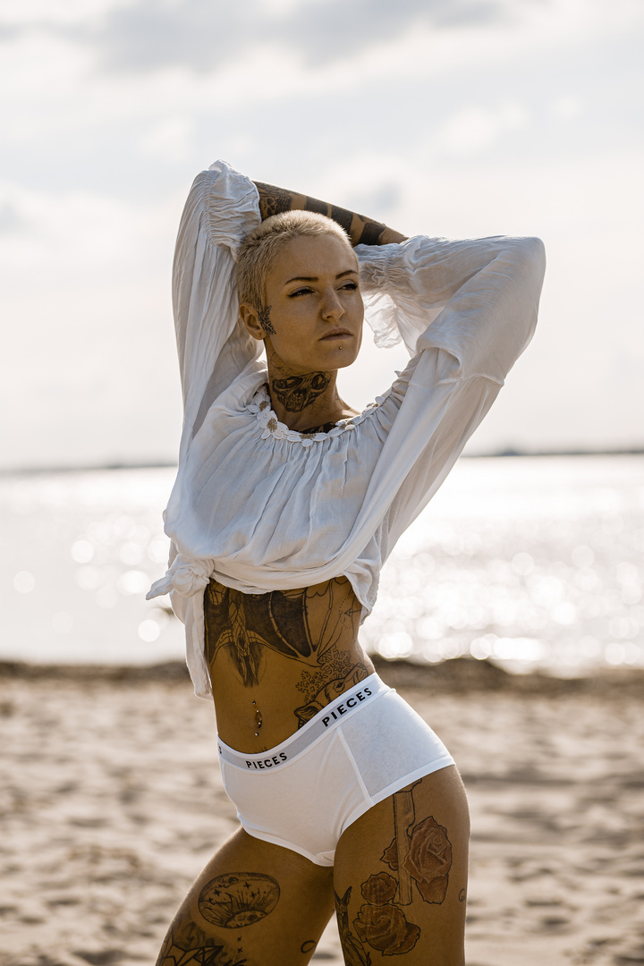 inked girl at the beach