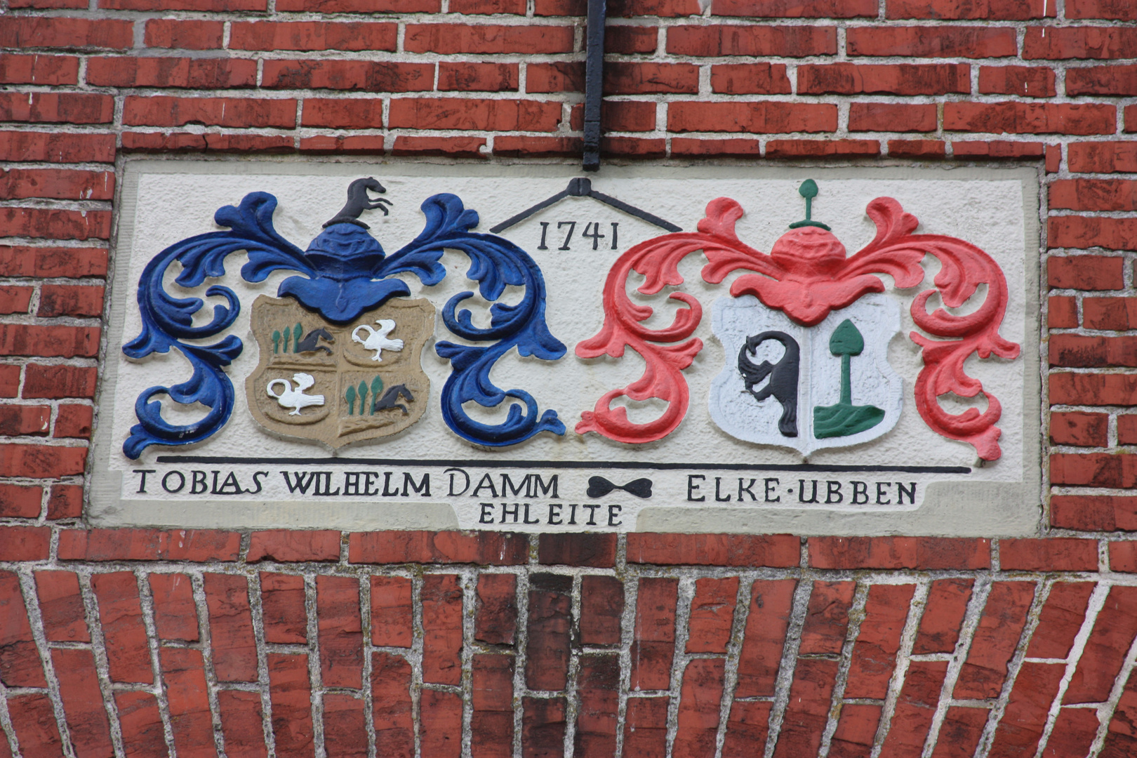 Inschrift auf einem Fischerhaus in Greetsiel