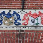 Inschrift auf einem Fischerhaus in Greetsiel