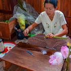 Intha woman producing silk fiber