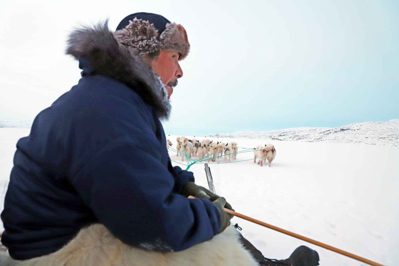 Inuit mit Hundeschlitten, Kangerlussuaq, Grönland