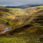 Island Farborgie mit Regenbogen im südlichen Hochland