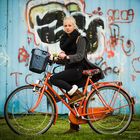 J. and her orange bike