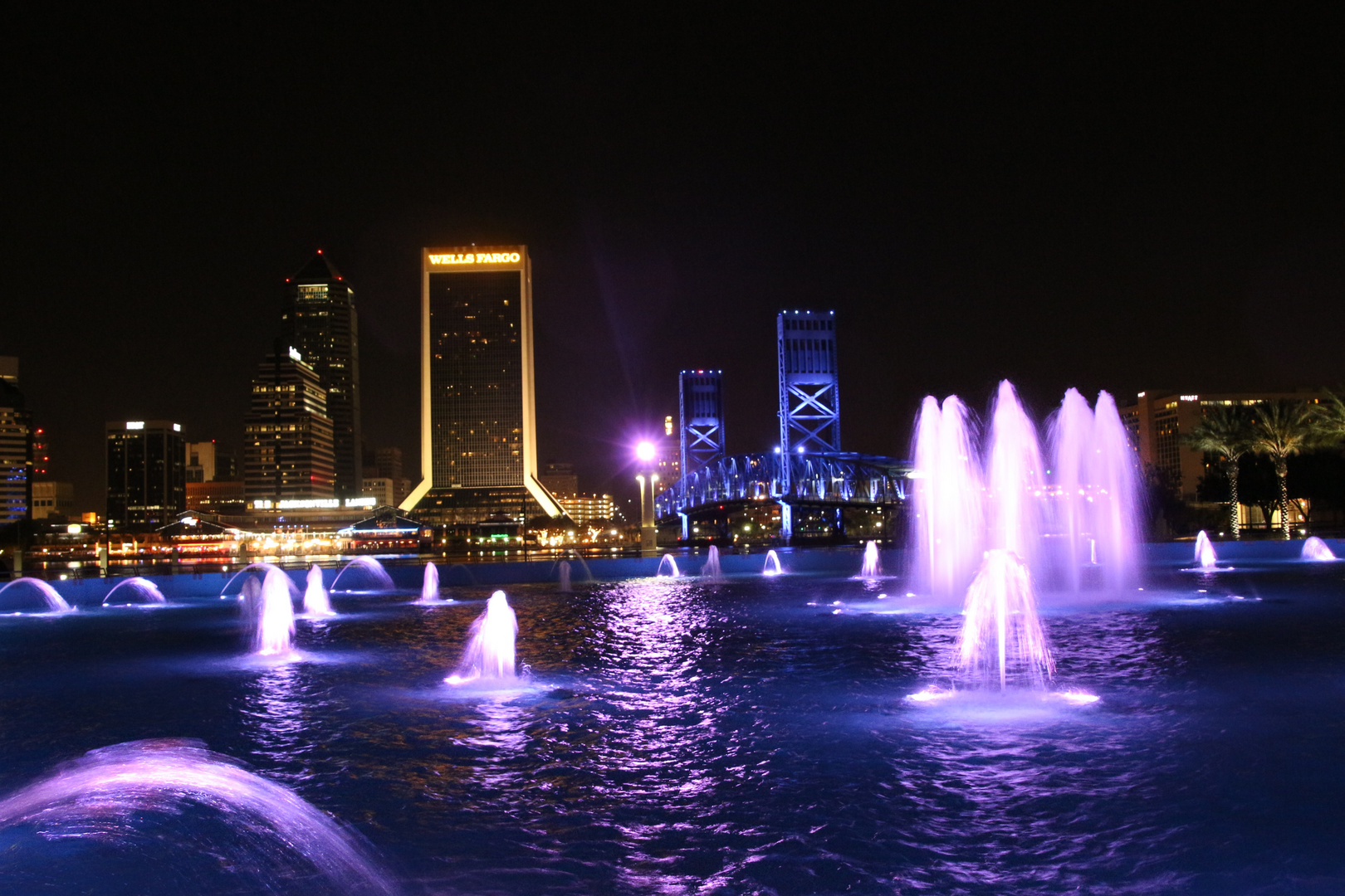 Jacksonville, FL; Friendship Fountain and Main Street Bridge at night.