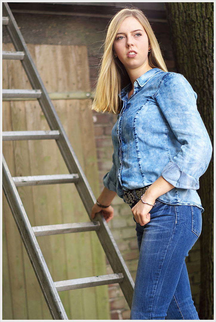 Jeans-Girl on the Ladder