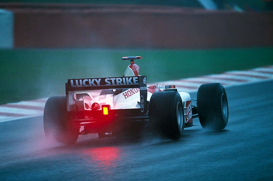 Jenson Button of BAR in a rainy Spa practice session