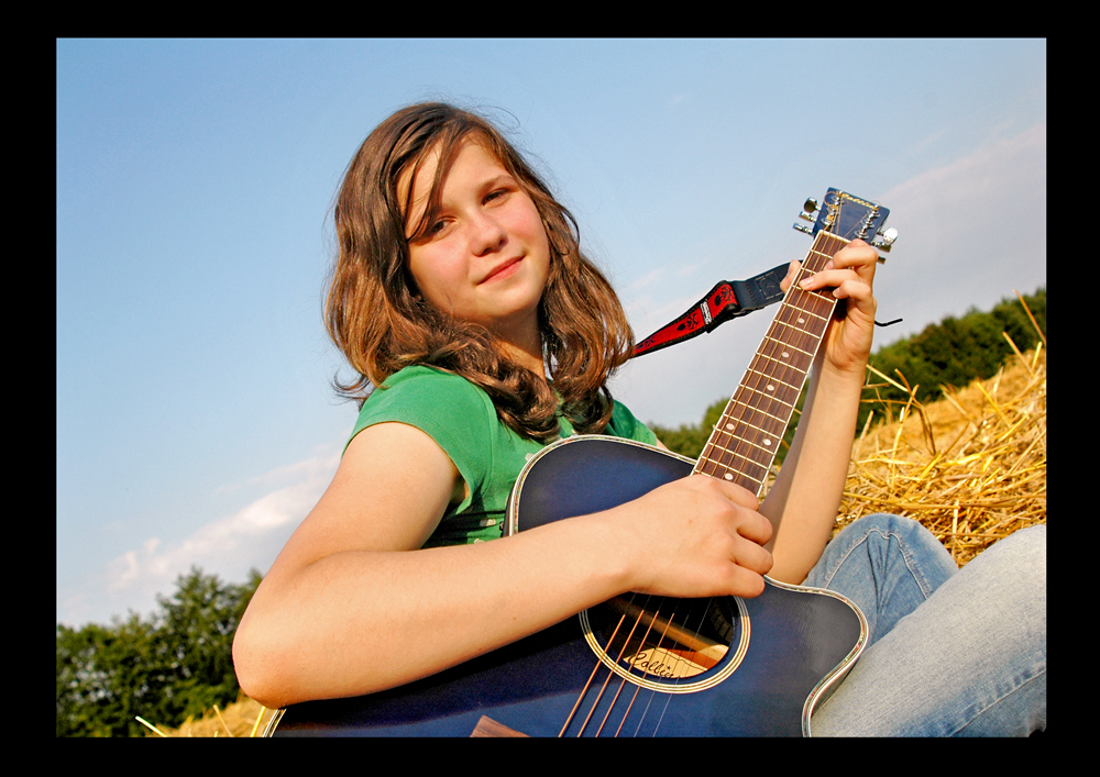 Jessica und ihrer Gitarre im Spätsommer 2009