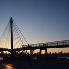 Joggen gen Sonnenaufgang auf der Passerelle de Deux Rives