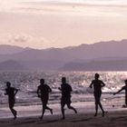 Jogger bzw. Training einer Fußballmannschaft