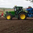 John Deere 6830 mit HE-VA Frotpakker und Lemken Solitair 9