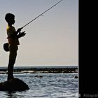 Junge beim Fischen auf Bali