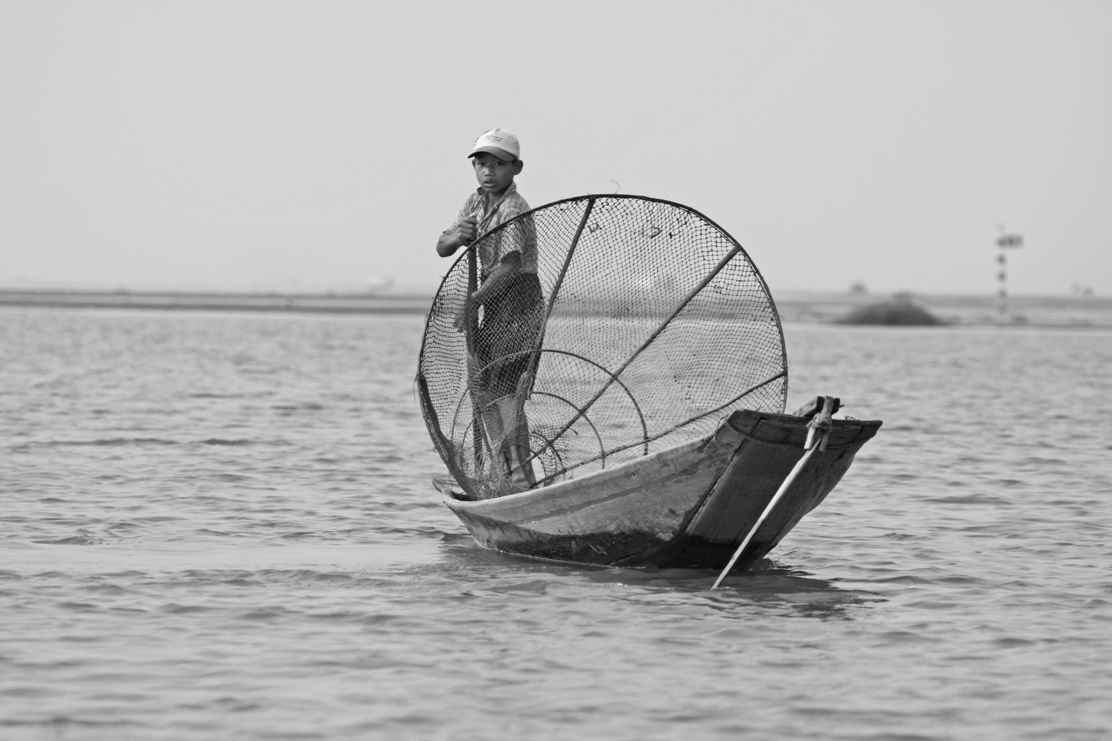 Junger Fischer am Inlesee