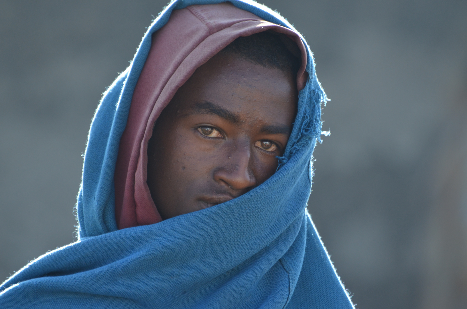 Junger Mann in einem Dorf der Oromo-Region (Äthiopien)