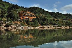 Jungle housing beside Maenam Ou