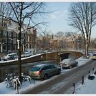 Kanal und Hauser mit Schnee in Amsterdam