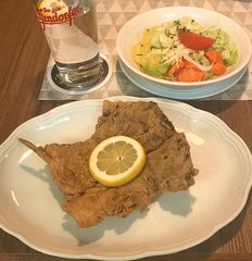 Karpfenfilet mit gemischten Salat