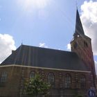 Kerk met zonnestralen