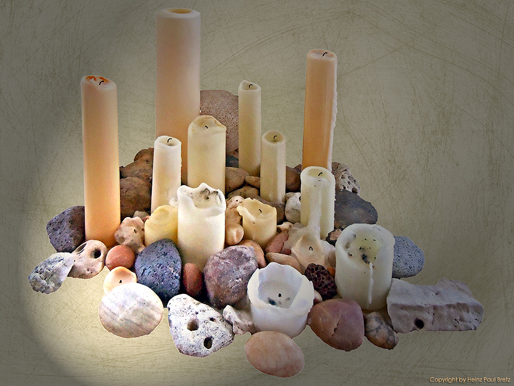 Kerzen und Steine