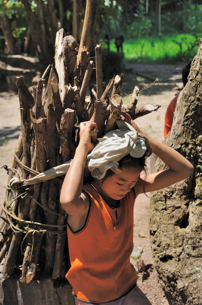 Khamu girl in the forest