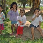 Kids greeting in front of the silk manufacture