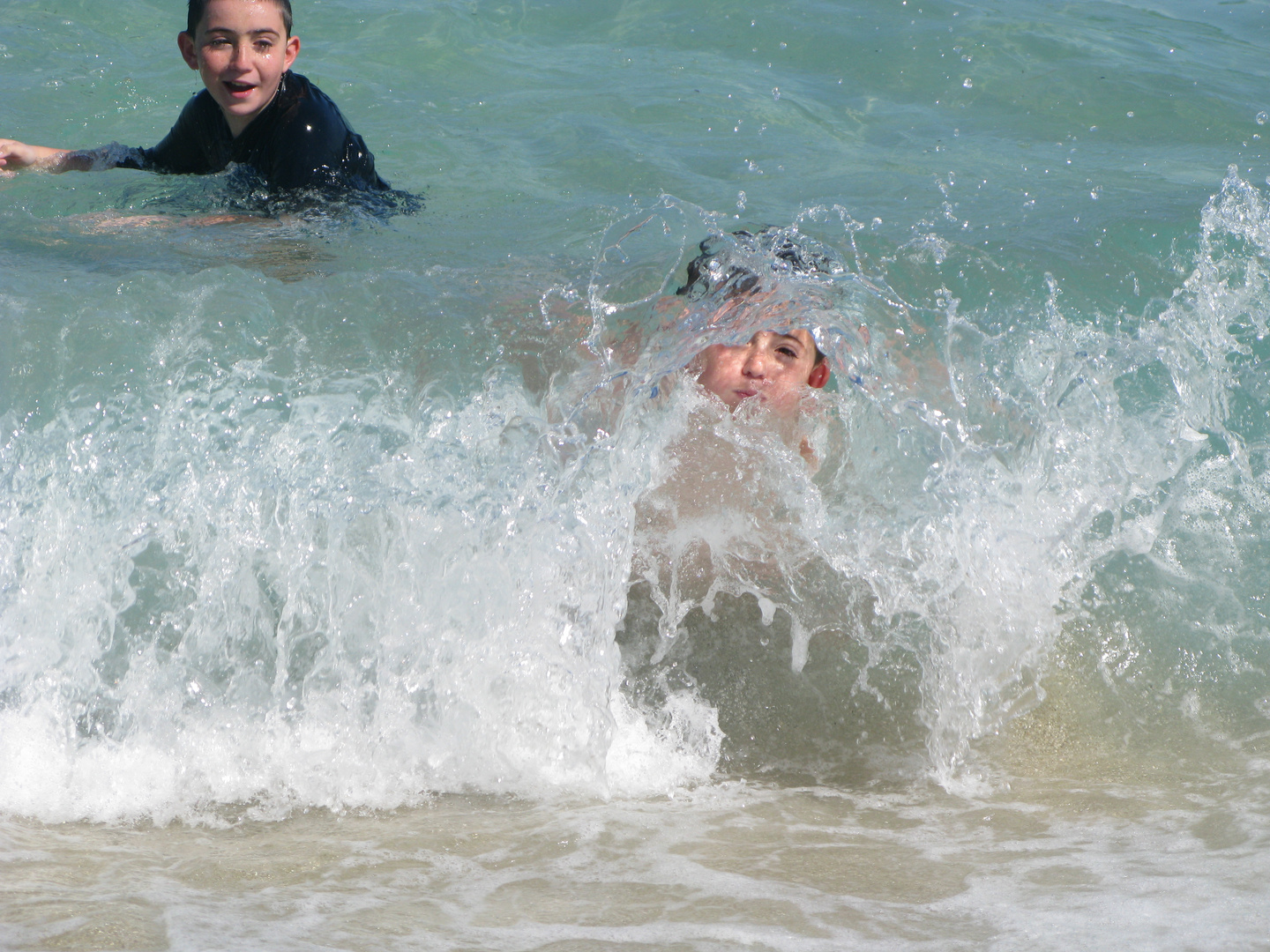 Kids in the waves