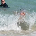 Kids in the waves