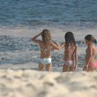 Kids playing close to water on a sunset...