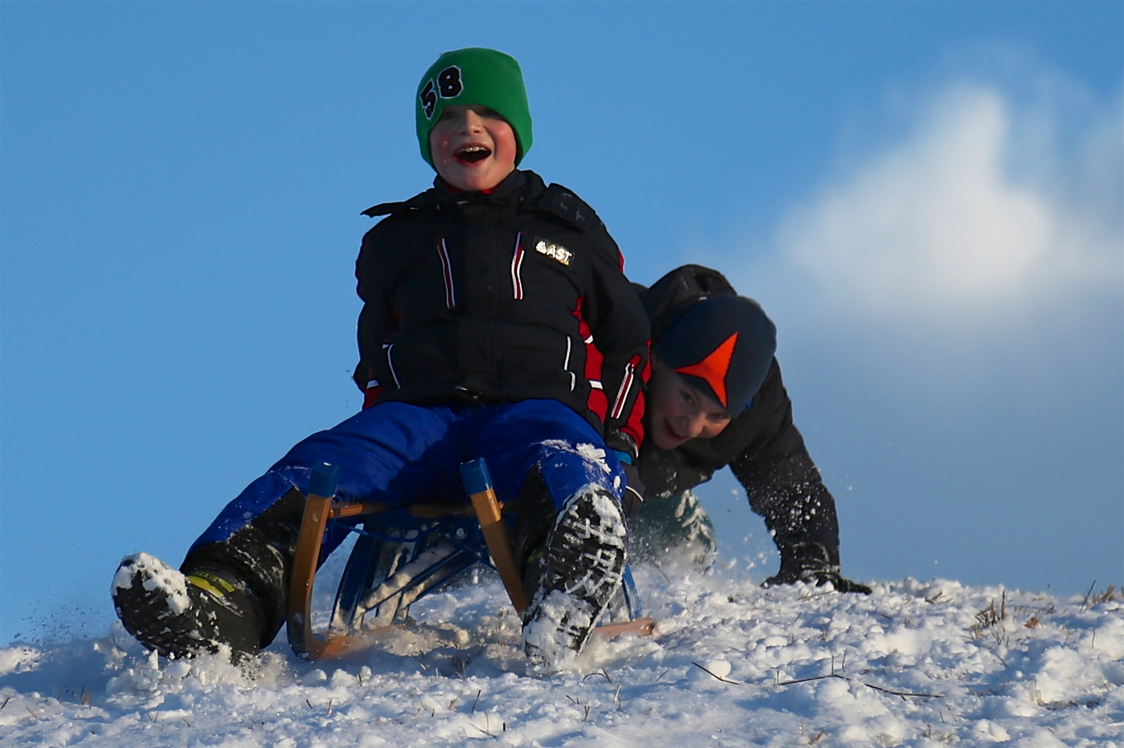 Kids Schlittenfahren