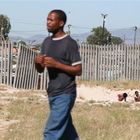 Kids taking a dump in the sand-Township near Capetown