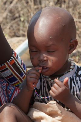Kind mit Massai