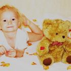 Kind mit Teddy