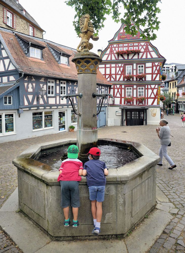 Kinder am Brunnen