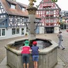 Kinder am Brunnen