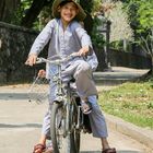 Kinder auf Fahrrad in Hanoi