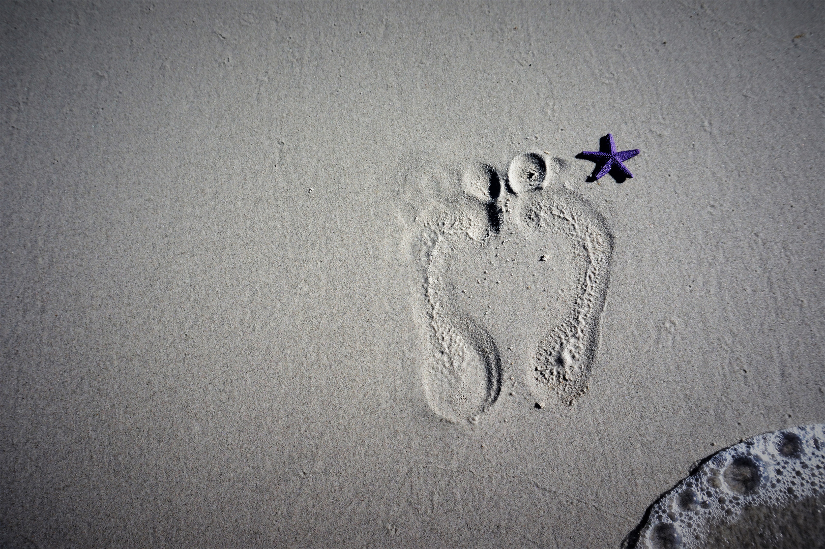 Kinder Füße im Meer