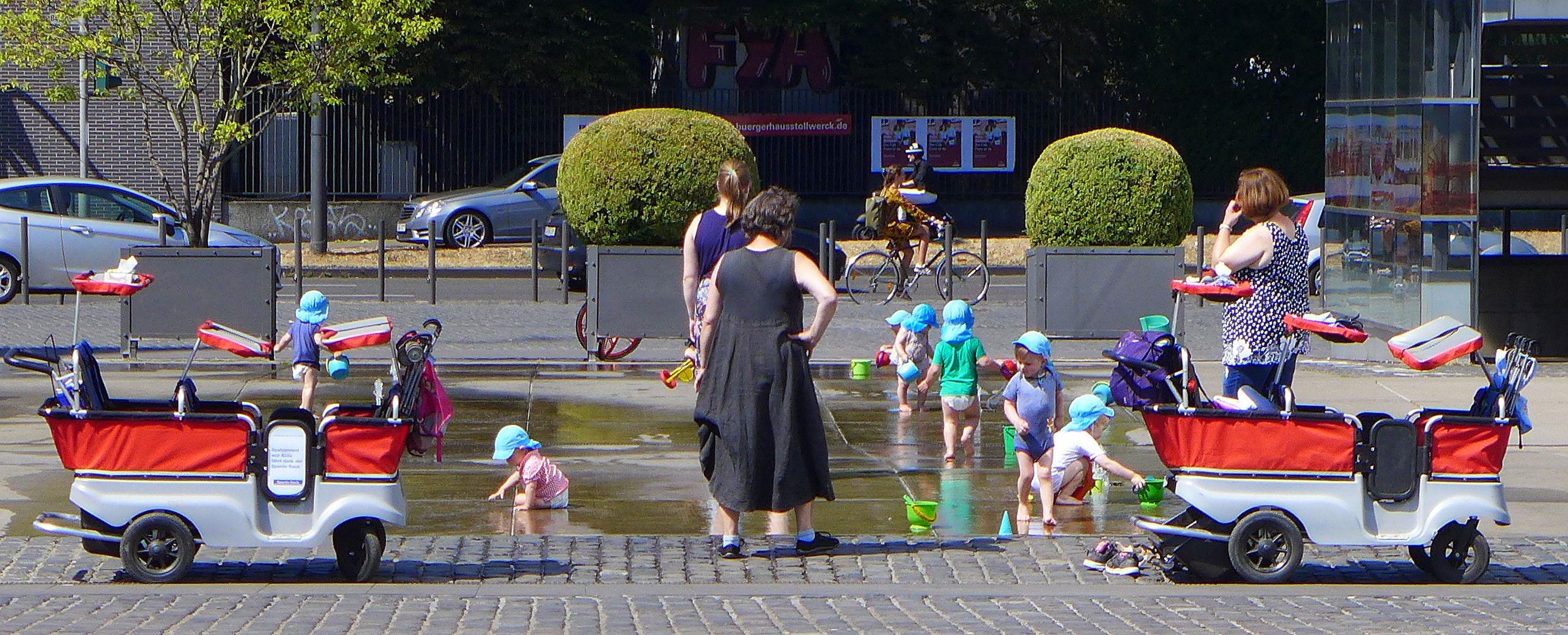 Kinderspass am Brunnen