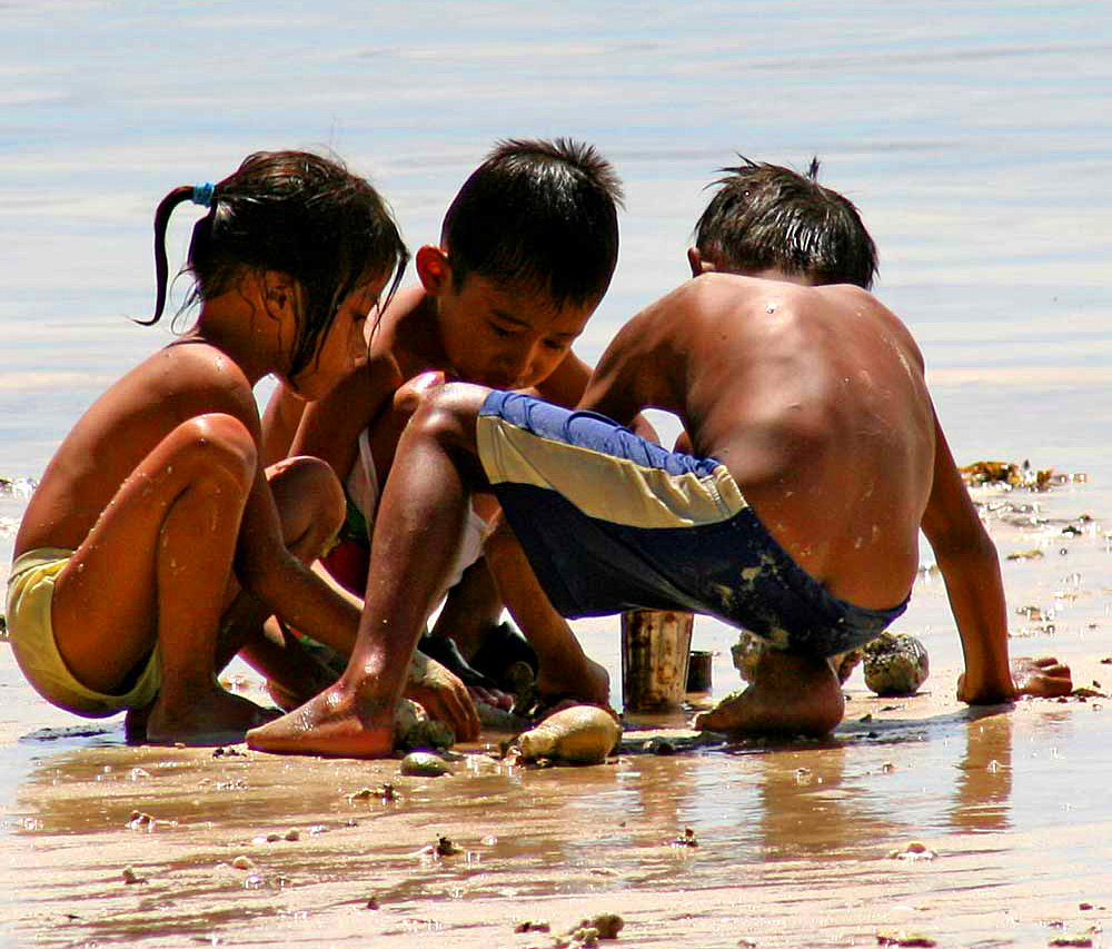 Kinderspiel am Strand