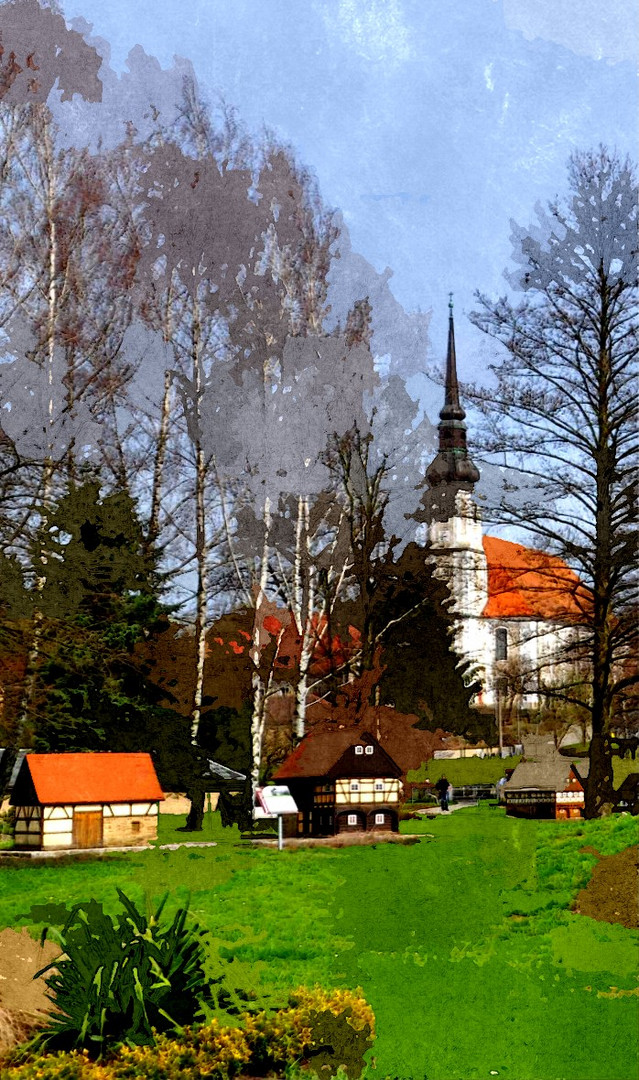 Kirche in Cunewalde mit Umgebindemodellen