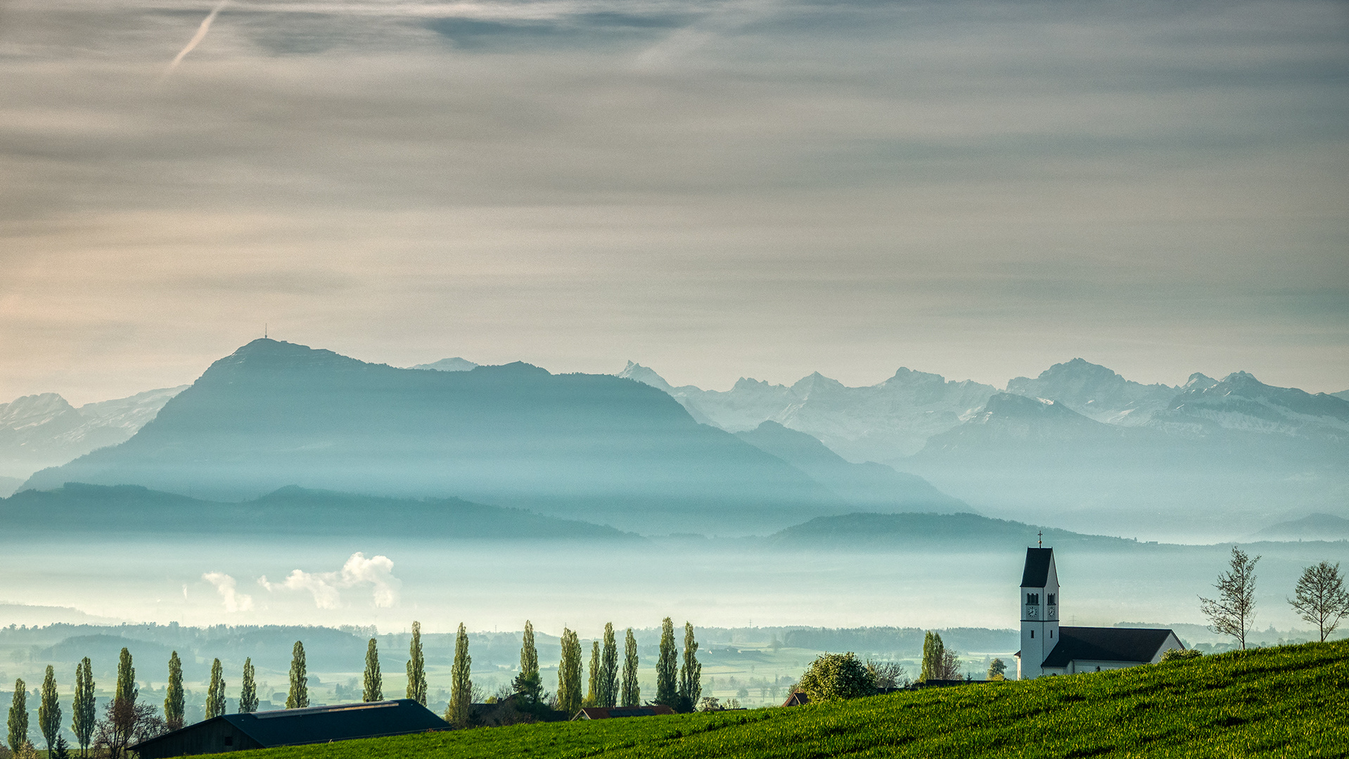 Kirche von Römerswil im Hintergrund die Rigi