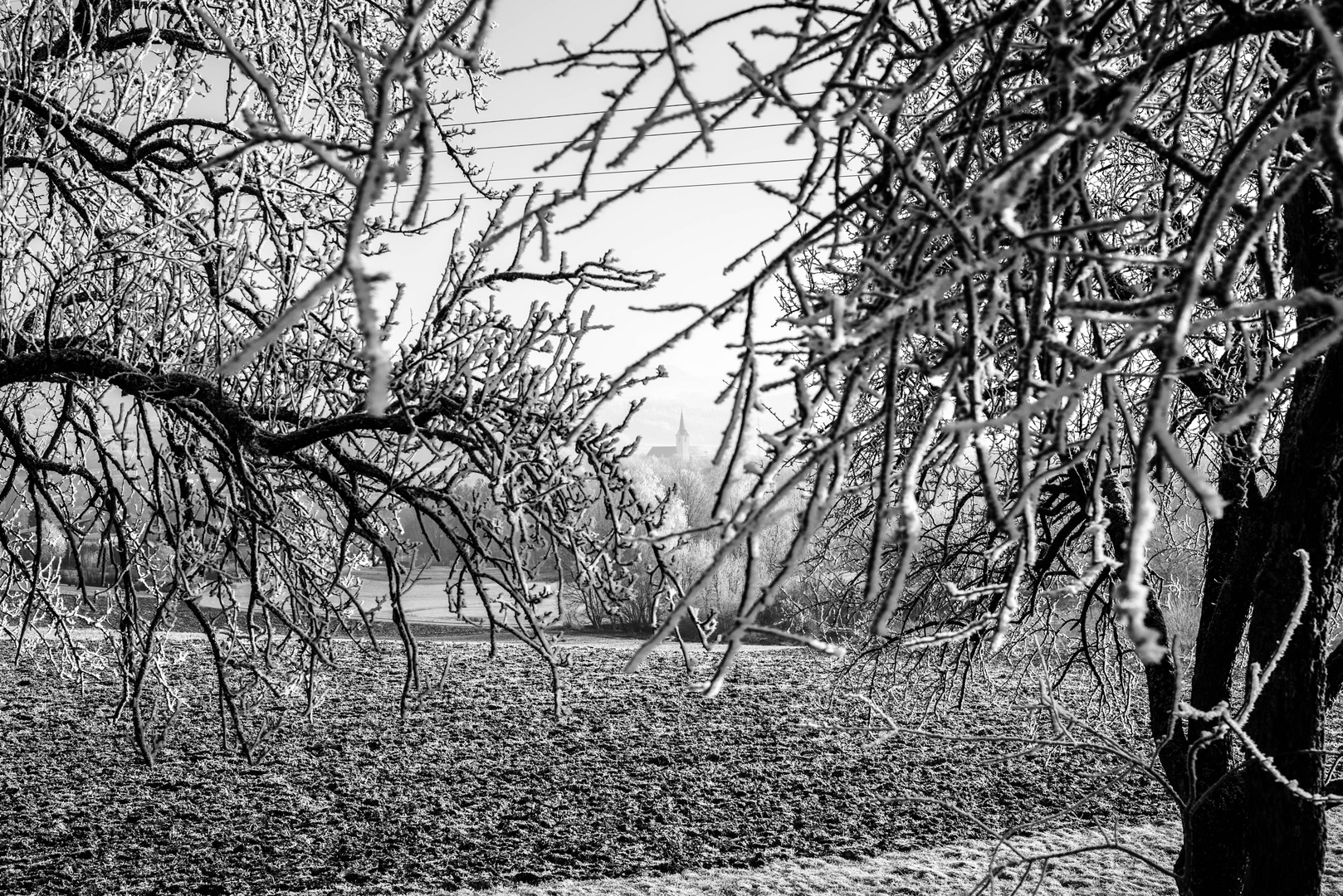 Kirchturm im Winter