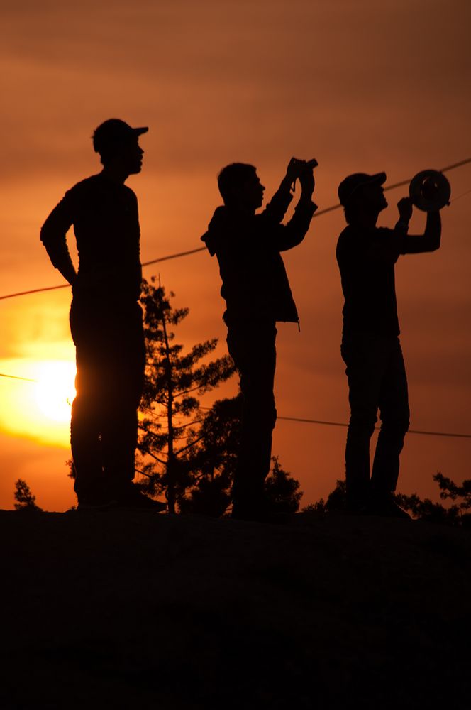 Kite runner and a photographer