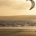 Kite surfer at sunset