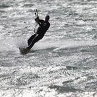 Kite surfer making waves