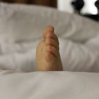 kleiner Fuß im Schlaf