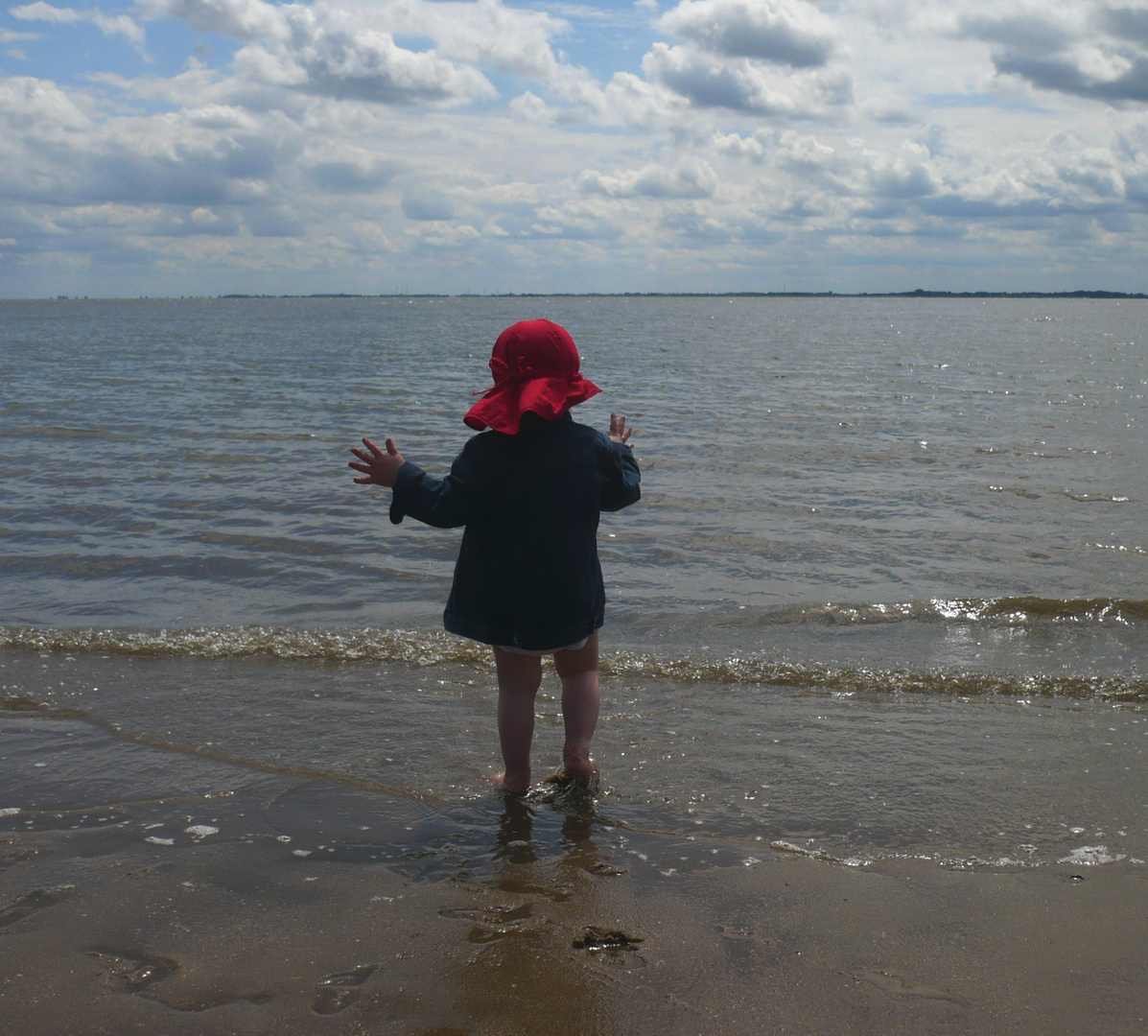 kleiner Mensch am Meer