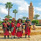 Koutoubia Moschee und Wasserträger in Marakesch