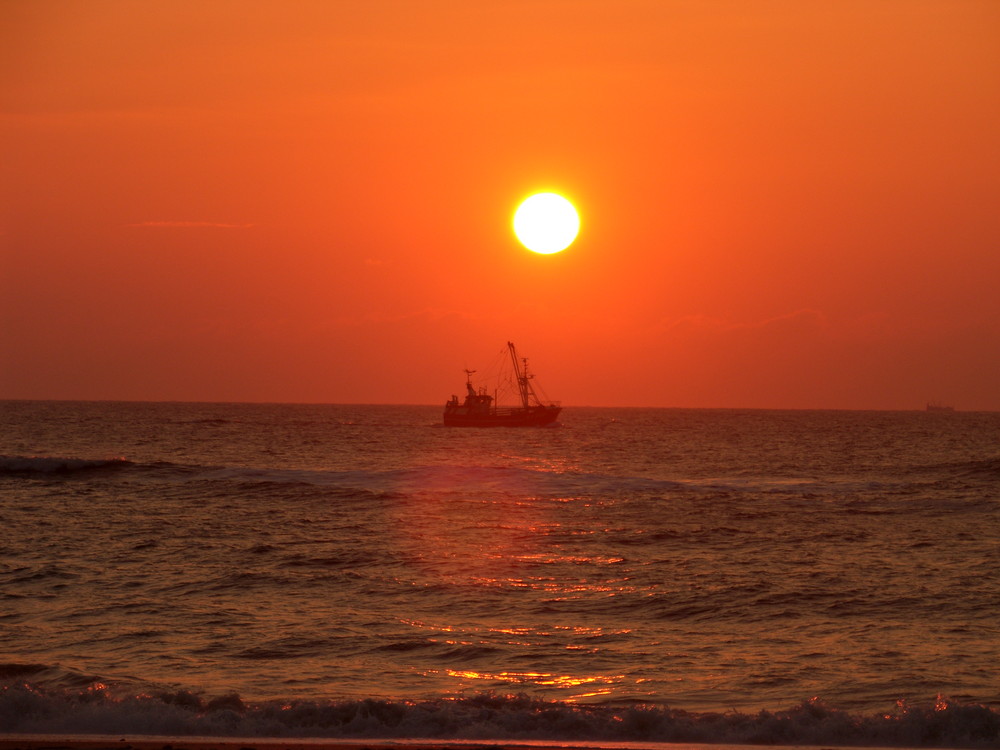 Kutter im Sonnenuntergang